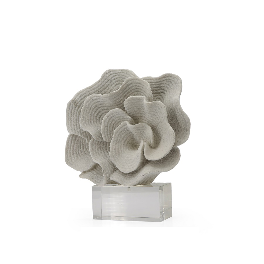 Coral in white resin on glass base